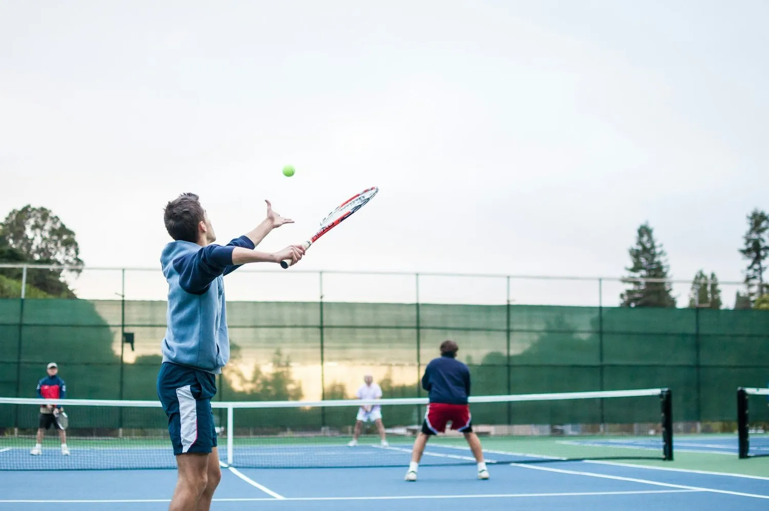 Tennis players during a group session